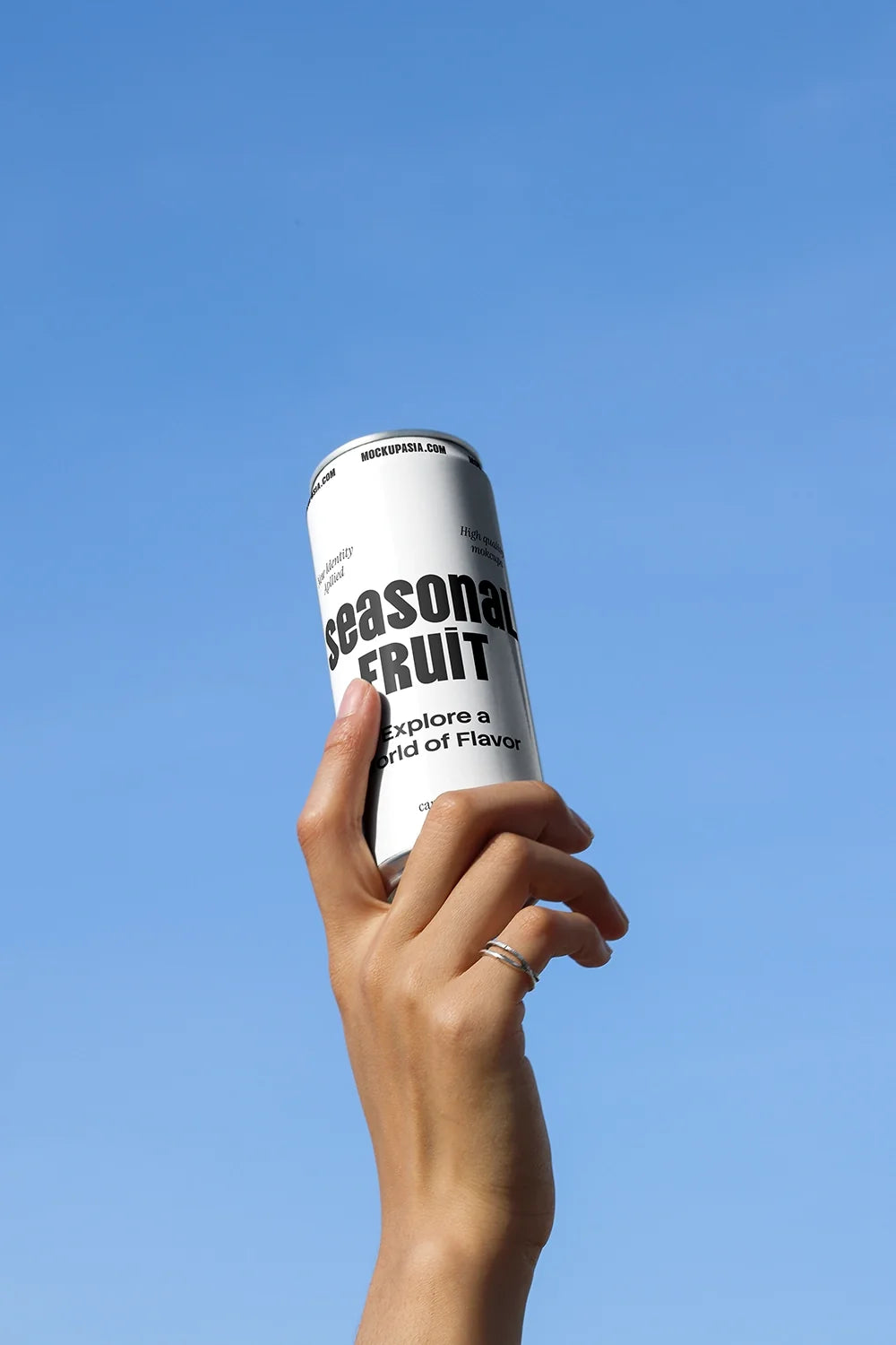 Slim Can Mockup CF32 – Held Upward, Blue Sky