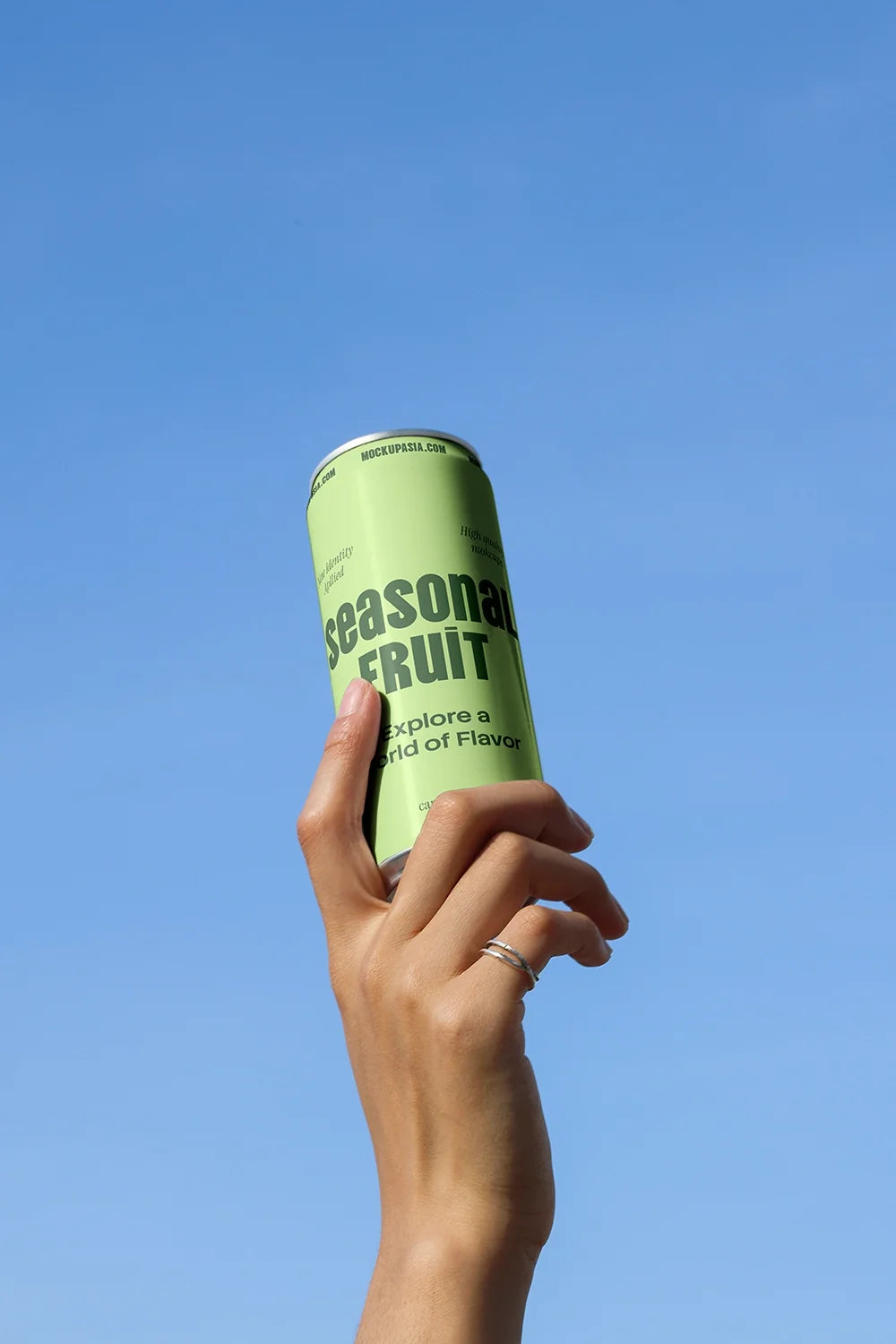 Slim Can Mockup CF32 – Held Upward, Blue Sky