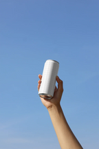 Slim Can Mockup CF09 – Lifted Against Sky