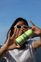Slim Can Mockup CF28 – In Hand, Bright Sky