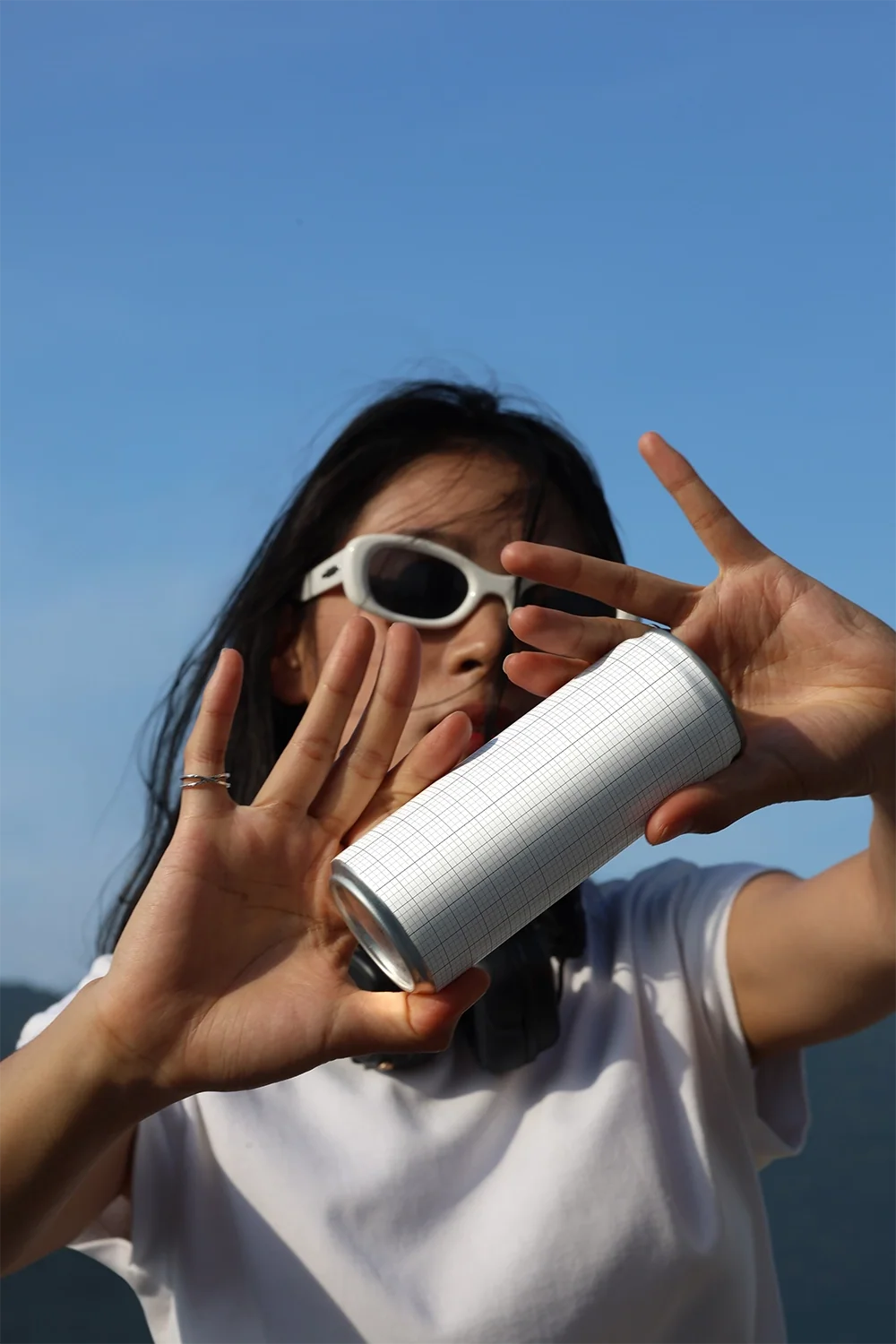 Slim Can Mockup CF28 – In Hand, Bright Sky